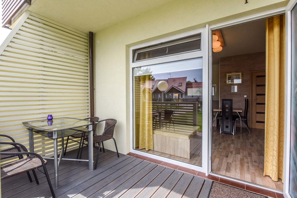 Apartamentai Trys Pusys Швентой Экстерьер фото