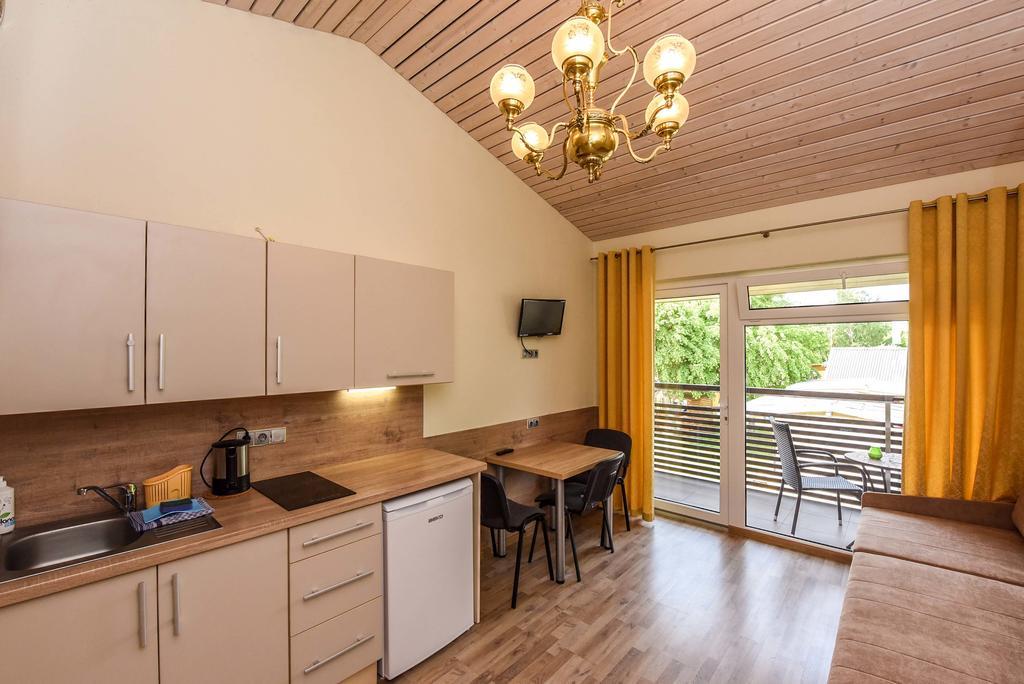 Apartamentai Trys Pusys Швентой Экстерьер фото