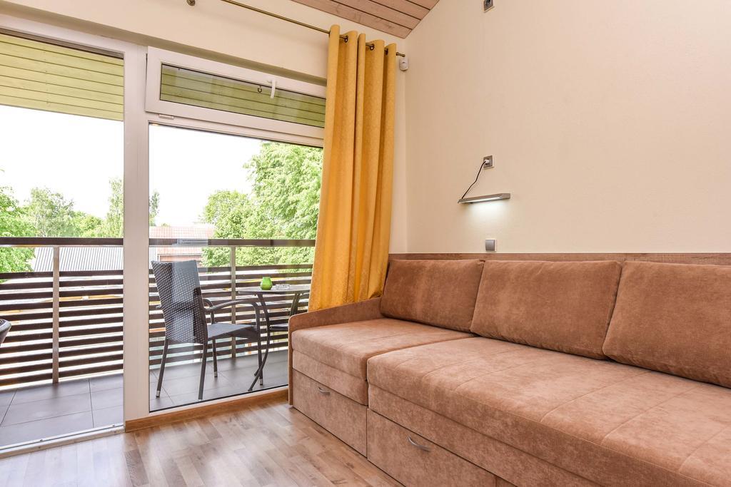 Apartamentai Trys Pusys Швентой Экстерьер фото